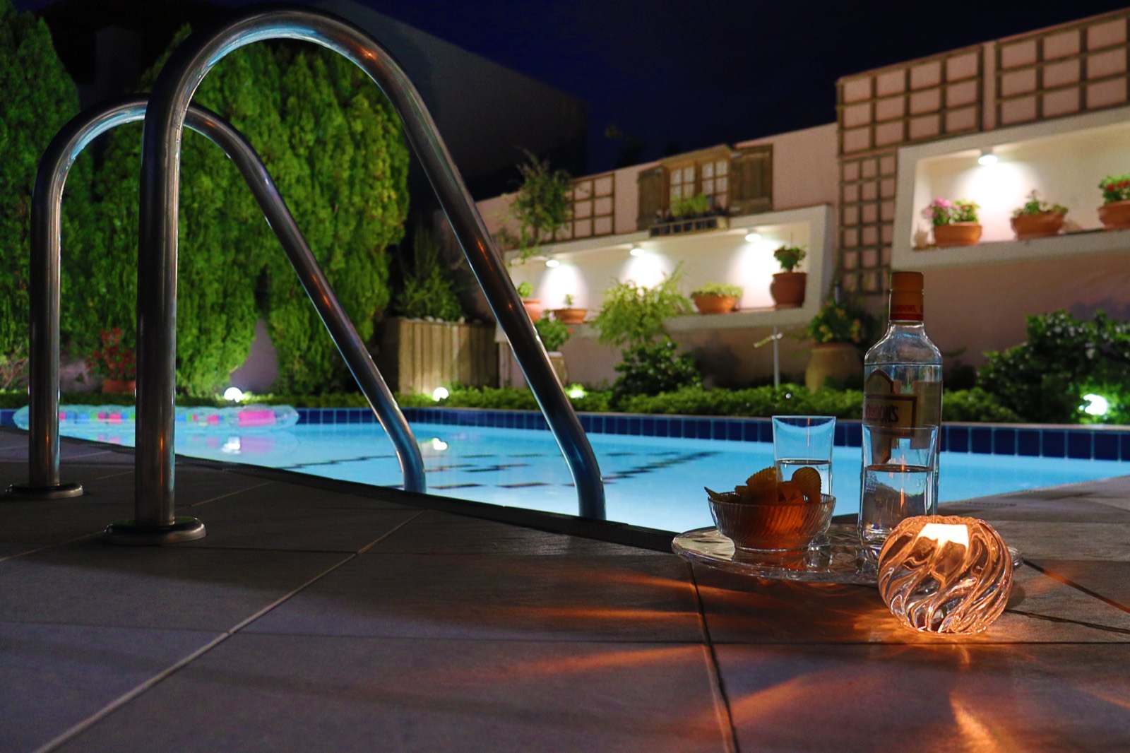 The pool lit up at night