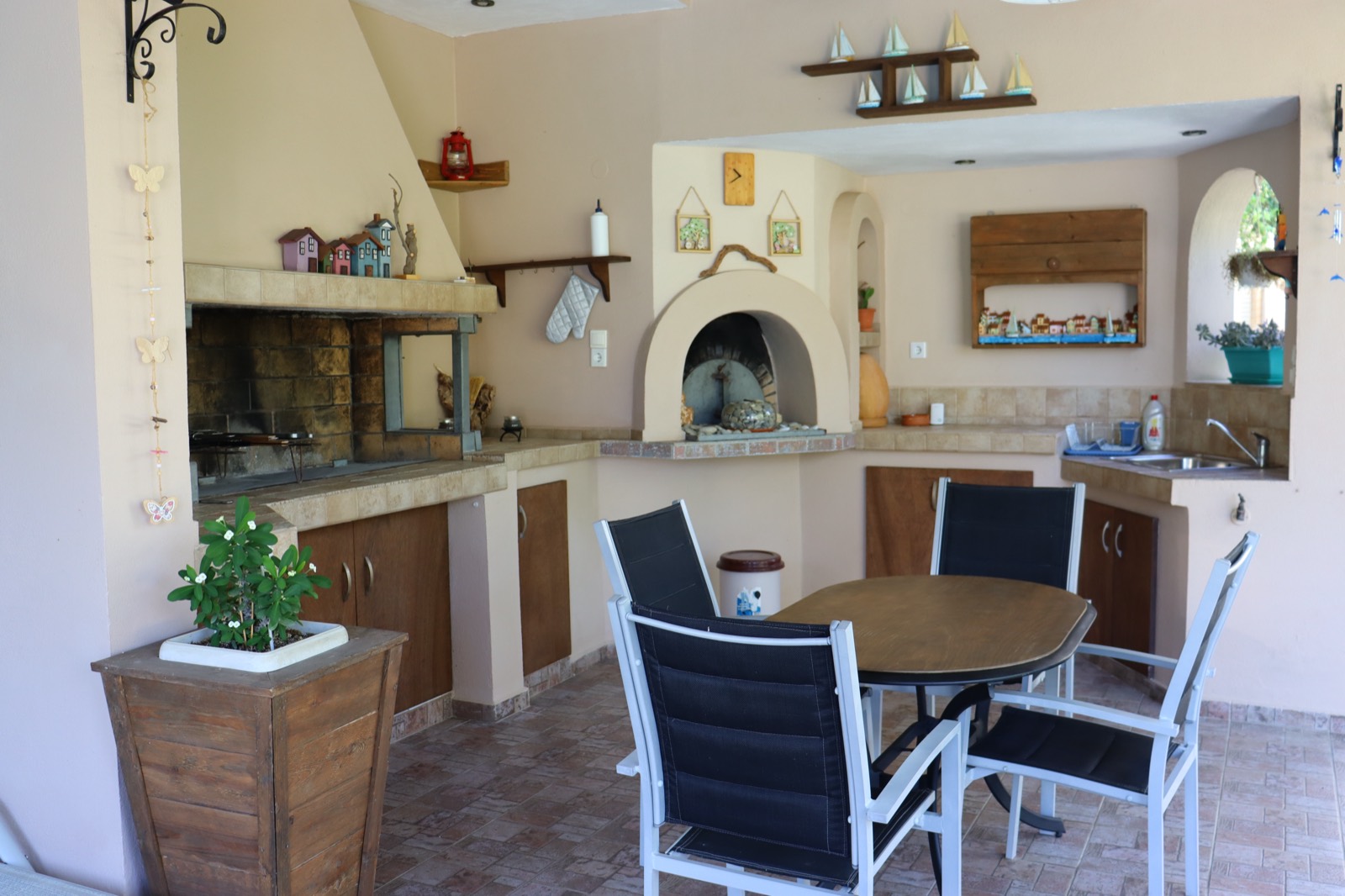 Outdoor kitchen with wood oven