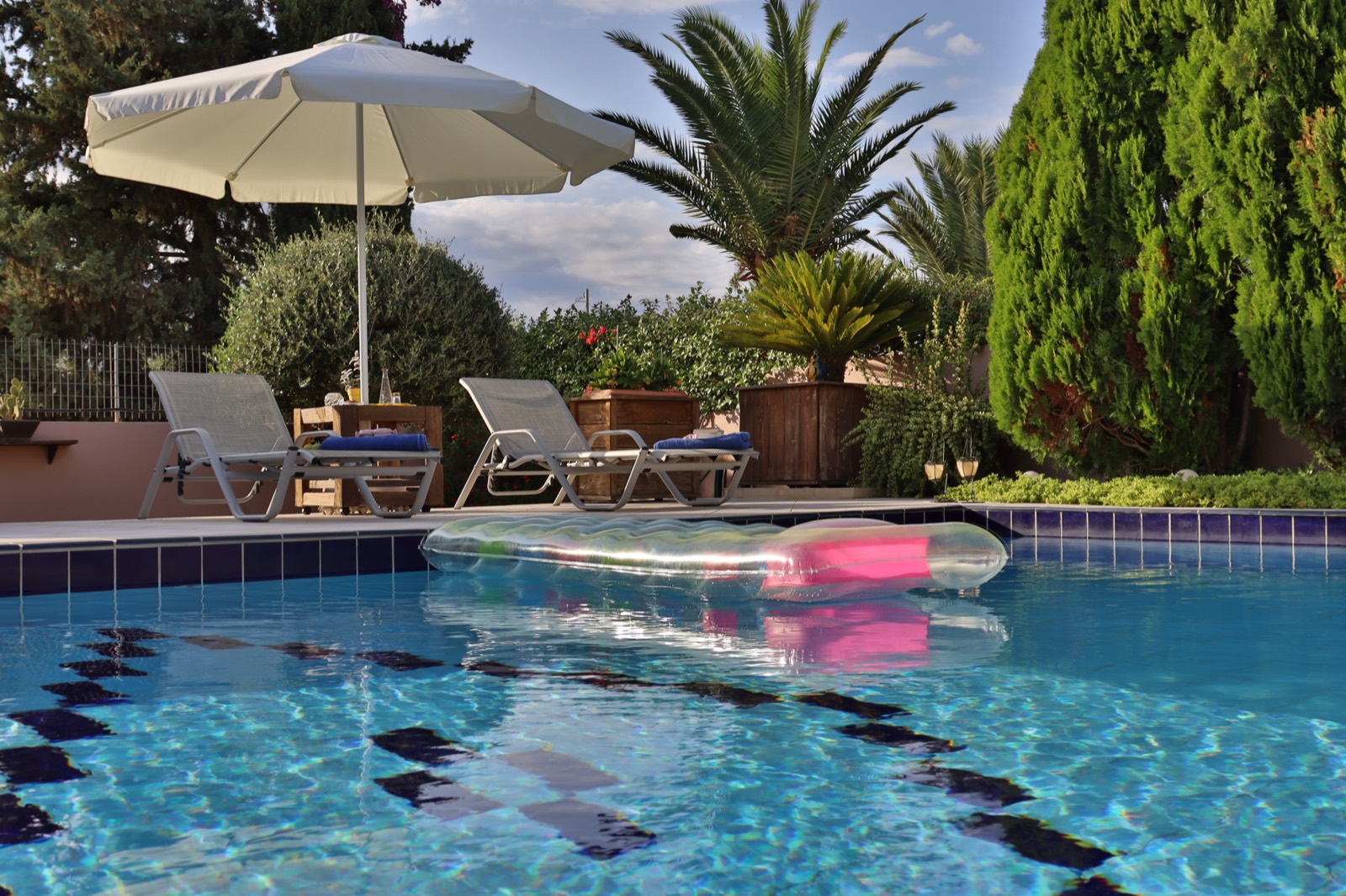 Private pool with sun loungers at Olive Villa Crete